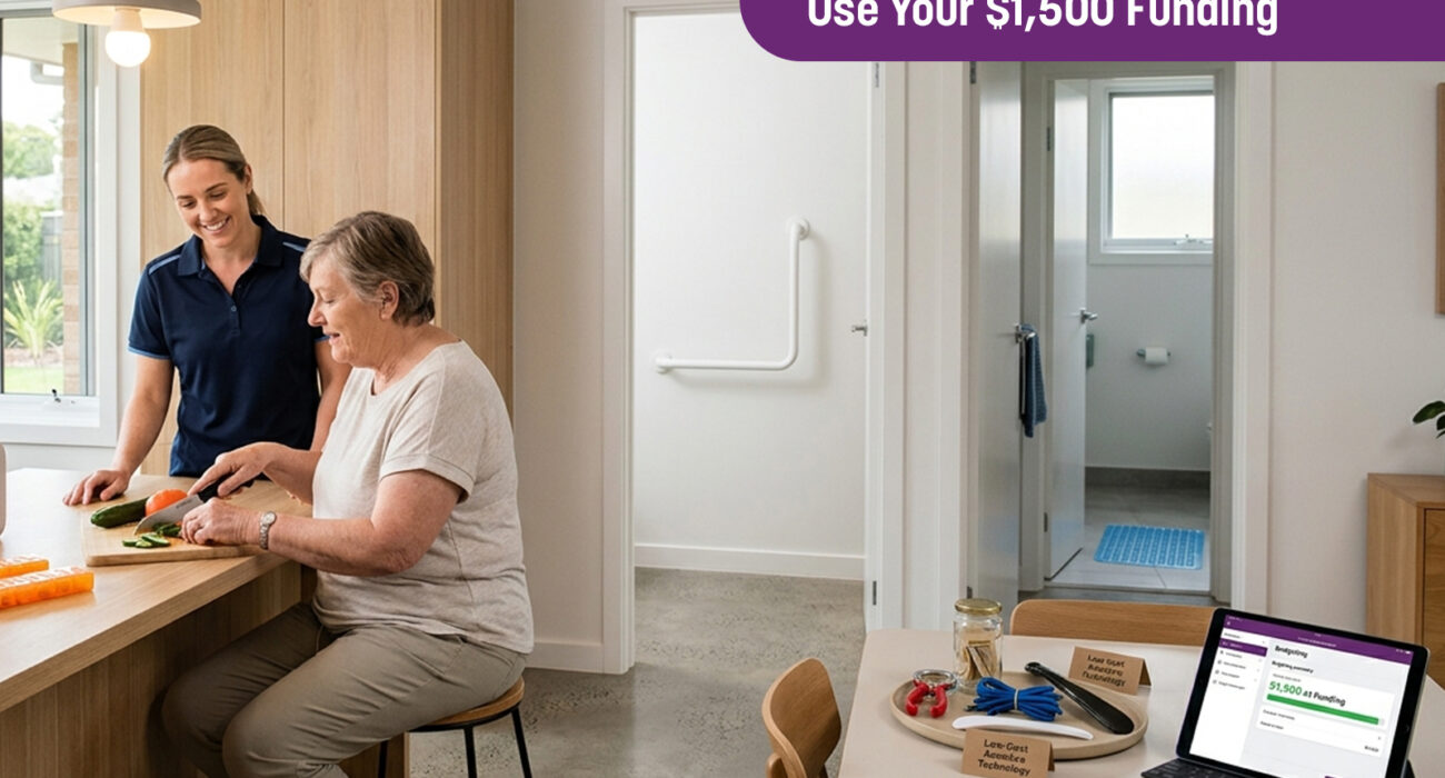 A nurse supporting an NDIS participant in a kitchen with visible home modifications, demonstrating items from the NDIS Low-Cost AT List 2026 under the $1,500 funding limit.